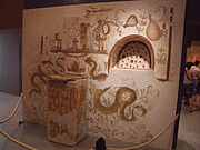 Archibald Maclaren has suggested that belief in kobolds derives from Roman beliefs in lares and penates. Such household deities were worshipped in shrines such as this lararium in Pompeii.