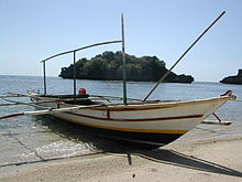 Pump boat that is used for fishing and to ferry passengers, on a beach 