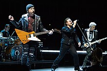U2 performing in London in October 2018 during the Experience + Innocence Tour, a sequel to their 2015 tour U2 performing on Experience and Innocence Tour in London 10-24-18 (3).jpg