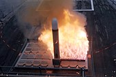 US Navy Mark 41 Tomahawk hot launch. US Navy 090825-N-1522S-020 A Tactical Tomahawk Cruise Missile launches from the forward missile deck aboard the guided-missile destroyer USS Farragut (DDG 99) during a training exercise.jpg