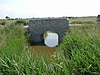 Bakstenen boogbrug over de Grote IJzerbeek