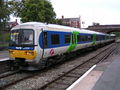 A Class 166 Network Express Turbo at Evesham in Thames Trains livery. The mauve 'F' was added when it was taken over by First Great Western.