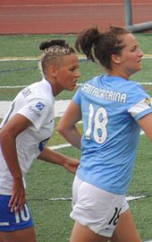 Sanderson with Chicago Red Stars' Jackie Santacaterina in 2013. 2013-06-09 RedStars v Breakers LianneSanderson JackieSantacaterina.JPG