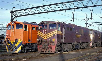No. 16-100A & B (E1272 & E1273) in "SAR Gulf Red and whiskers", Germiston, 21 November 1991