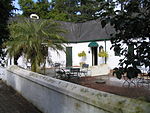 These farm-hands' cottages date from the year 1902 and were probably designed by Sir Herbert Baker, the architect.