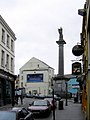 A monument to Irish nationalist hero Daniel O'Connell stands atop a tall column in O'Connell Square, the site of the old courthouse where he won the Clare by-elections in 1828.