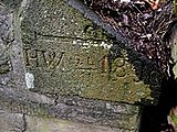 In Stein gemeißelte Markierung des Hochwassers vom 24. November 1890