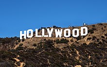 The Hollywood Sign, large white block letters on a hillside