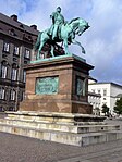 Fredrik VII framför Christiansborg i Köpenhamn av Herman Wilhelm Bissen, 1865