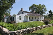 Built in 1776 by French-Canadian voyageur Joseph Roi, the Tank Cottage is the oldest standing building from the state's early years. Originally located on 8th Street along the Fox River, the cottage was moved to Heritage Hill State Historical Park in neighboring Allouez and is listed on the National Register of Historic Places. Tank Cottage Heritage Hill June 2014.jpg