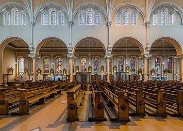 The stained glass looking across the nave