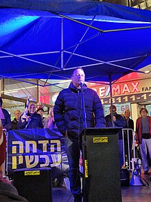 Eran Litman, the father of Oriya Litman who was murdered by Hamas at Re'im music festival massacre, speaks at event in Haifa Eran Litman, the father of Oriya Litman who was murdered cy Hamas at Re'im music festival massacre, speaks at the event (3).jpg