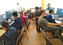 Technology usage in the classroom can be beneficial for English-language learners. Karvachar Armath Lab at work.jpg