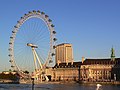 The London Eye and County Hall on the banks of the Thames, London