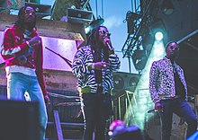 Migos performing in August 2017; from left to right: Quavo, Takeoff, and Offset