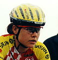 Anna Millward wearing a cycling helmet and eye protectors