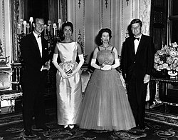 President John F. Kennedy and First Lady Jacqueline Kennedy meet with Queen Elizabeth II and Prince Philip at Buckingham Palace, London, England (1961) Queen Elizabeth and Prince Philip host Queen's Dinner for President and Mrs. Kennedy.jpg