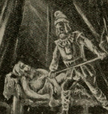 A man (Amalickiah) is lying down on a cot. Another man (Teancum), wearing a helmet, a pauldron (or necklace?), shin guards, and what seems like an armored skirt, stands over Amalickiah and is using a javelin to stab him.