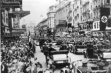 Adolf Hitler greeted by cheering crowds in Vienna, following the annexation of Austria into the III Reich, 15 March 1938 Bundesarchiv Bild 146-1985-083-10, Anschluss Osterreich, Wien.jpg