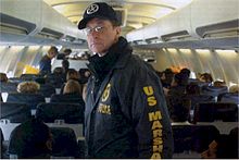 A U.S. Marshal on a "JPATS" flight. Conair-Marshal.jpg