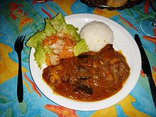 A Mauritian Creole dish of curry with rice and a salad Creole dish in Mauritius.JPG