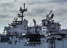 Damage of the superstructure of the ship after the fire. Damage control efforts continue on USS Bonhomme Richard LHD-6 (200716-N-SS350-1010).jpg