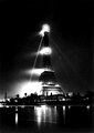 1889 - the Eiffel tower and the grounds of the Exposition Universelle on the Champs de Mars at night.