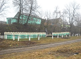 Расстрельный ров и памятник на месте массового убийства евреев в Дзержинске