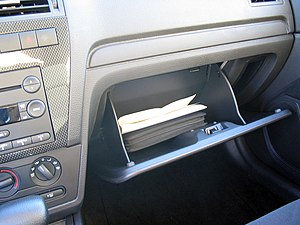 Glove box with owner's manual.