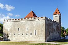 Kuressaare Castle, square stone keep with one square corner tower and red tile roof