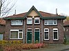 Woninggroep Nuinhof: 2 arbeiderswoningen