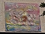 Panéllo ceràmico inte Stràdda Tembien ch'o rafigûa a rimoçión da néive dòppo a "Calàdda" do 1479