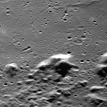 Hollows on a mountain peak within Sousa crater