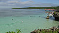 Berenang di pantai Tanjung Bira