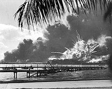 The USS Shaw explodes during the Japanese attack on Pearl Harbor.