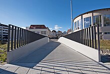 Die erstmals ausschließlich mit Carbon bewehrte Brücke wurde in Albstadt-Ebingen errichtet. Die Brücke hat eine Breite von 3 m, eine Spannweite von 15 m und ein Gewicht von ca. 14 t. Die Fahrbahndicke beträgt 9 cm und die Dicke der Brüstung 7 cm. Die Brücke kann mit einem Räum- und Streufahrzeug mit einem Gewicht von bis zu 10 t befahren werden.