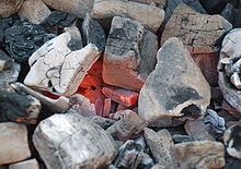 Charcoal burning Charbon de bois rouge.jpg