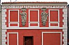 Sculptures of Saints Peter and Paul on the facade of an 18th-century townhouse