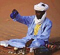 Man pouring tea (2015)