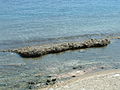 Fig. 31: formazione a beach rock lungo la costa siciliana dello stretto (foto dalla spiaggia)