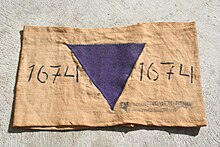 An example of a purple triangle used to identify Jehovah's Witnesses Purple Triangle.JPG