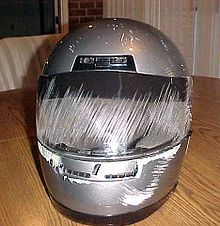 Accident damaged helmet shows how the chinbar and face shield protected the user Swisherhelmet1.jpg