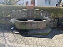 Brunnen an der Feuerwehr in Treisberg
