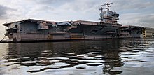 ex-John F. Kennedy docked at the Naval Inactive Ship Maintenance Facility in Philadelphia, October 2018 A640, USS John F Kennedy, starboard side, Navy Yard, Delaware River, Philadelphia, 2018.jpg