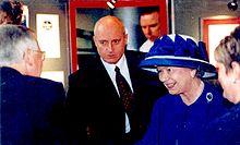 Queen Elizabeth II with Anthony J. Moses during her visit in Cardiff University in 2000 AJ Moses and Queen.jpg