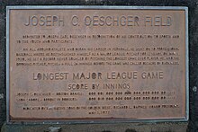 Metal plaque with a dedication to Oeschger