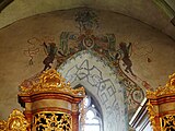 Renaissance painting and ornamental imagery (Bandelwerk) on the eastern window of the chancel