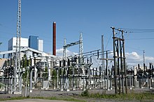 High-voltage substation in Kaanaa, Pori, Finland Kaanaan polttolaitos ja Kemiran putkia.jpg