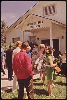 Christians gather at a nondenominational congregation of the Churches of Christ in Texas LEAKEY'S CHURCH OF CHRIST AFTER SUNDAY SERVICES - NARA - 546233.jpg