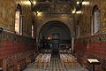 Vue de l'intérieur de l'église, avec au fond la tribune et l'orgue.